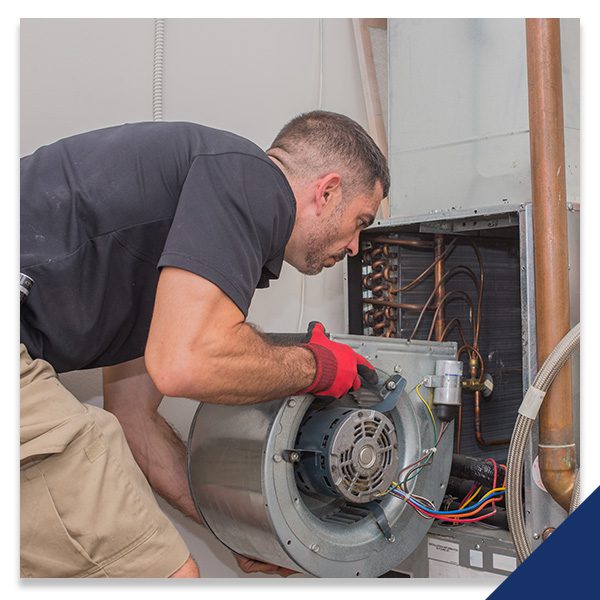 technician working on an hvac system