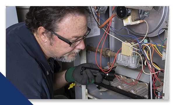 technician working on an hvac system