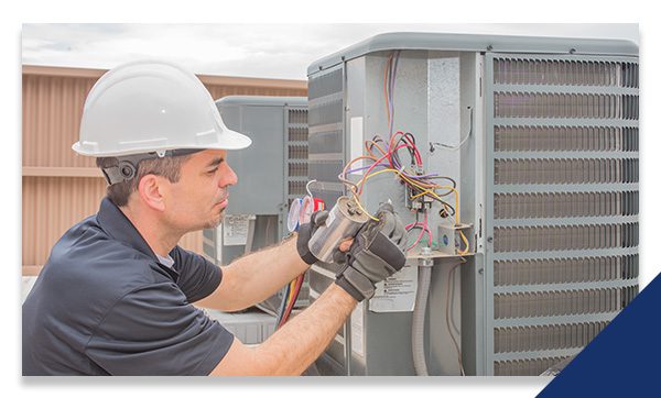 technician working on an hvac system