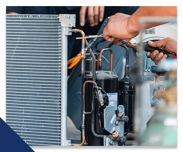 technician working on hvac system