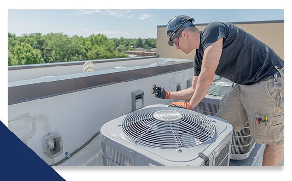 technician working on hvac system